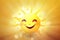 a yellow sun with a smiley face on a yellow background with rays of light coming through the sun\\\'s eyes and a smiley face