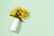 Yellow sunflowers in white vase , view from above. Bright autumn blooming flowers with copy space