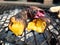 Yellow sweet potatoes on charcoal stove. colourful high energy diet