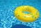 Yellow Swimming Pool Ring Float in Vibrant Blue Water\\\