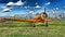 Yellow T-6 Harvard airplane during airshow.