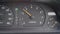 The yellow tachometer needle goes up three times on the dashboard of the car