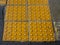 Yellow tactile paving in public place