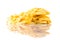 Yellow Tagliatelle Taglionlini pasta on white background