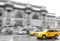 Yellow taxi Cab at The Metropolitan museum in New York City in black and white toning with motion blur effect