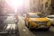 Yellow taxi crossing the street in Manhattan