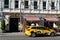 Yellow taxi at the hotel on Rozhdestvensky Boulevard in Moscow