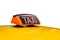 Yellow taxi roof and sign isolated
