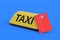 Yellow taxi sign near credit card. Payment for carrier services