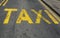 Yellow taxi traffic sign.