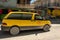 Yellow taxi van on the street of San Pedro, Belize