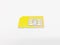Yellow Telecommunication Mobile Phone Wireless Sim Card in White Isolated Background 01