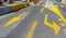 Yellow temporary lane markings at a crossroad