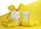 Yellow theme gift box with yellow polka dot ribbon and white copy space