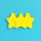 Yellow three abstract stars on bright blue background in pastel colors