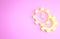 Yellow Time Management icon isolated on pink background. Clock and gear sign. Productivity symbol. Minimalism concept