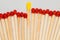 Yellow tipped match with red tipped matches