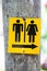 Yellow toilet signs
