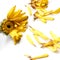 Yellow torn petals and faded yellow gerbera on a white background, isolated.