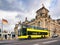 Yellow touristic bus at Reichstag building in Berlin