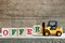 Yellow toy forklift hold letter block R to complete word offer