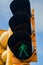 Yellow Traffic light with a luminous green signal