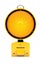 Yellow traffic warning lamp on white