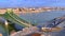 The yellow tram on the Liberty Bridge, top view, Budapest, Hungary