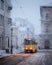 Yellow tram on Market central square in winter Lviv city