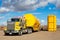 Yellow Transport With Oilfield Tanks