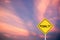 Yellow transportation sign with word penalty on violet cloud sky background