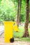 Yellow trash bin