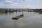 Yellow Tugboat Pushes Barge in Portland, Oregon