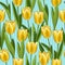 Yellow tulip seamless pattern, blue background