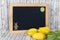 Yellow Tulips with blank Blackboard