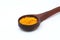 Yellow turmeric in wooden spoon,Ground turmeric on wooden spoon