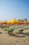 Yellow umbrellas and chaise lounges on the beach of Rimini in I