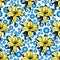 Yellow vanilla flowers seamless pattern on a background of blue air bubbles
