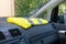 Yellow vest on a dashboard car in protest against tax increases