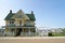 Yellow Victorian home.