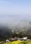 Yellow and villages on the hillside in spring, the mountain fog cover