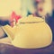 Yellow vintage metallic kettle