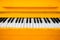 Yellow vintage piano