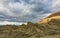 Yellow volcanic rocks and overcast skies