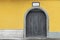 yellow wall and door stone at the jade Buddha temple, Shanghai, china