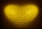 Yellow wall with heart shape light effect and shadow, abstract background photo