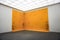Yellow wall of modern art in the Neues Museum in Nuremberg, Germany