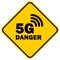 Yellow warning sign dealing with radiation from 5G radio waves which are believed to be harmful by conspiracy theories claiming it