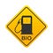 Yellow warning sign with the image of a biofuel pump. Warning about refueling