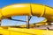 Yellow Water Slide Swimming Pool Closeup